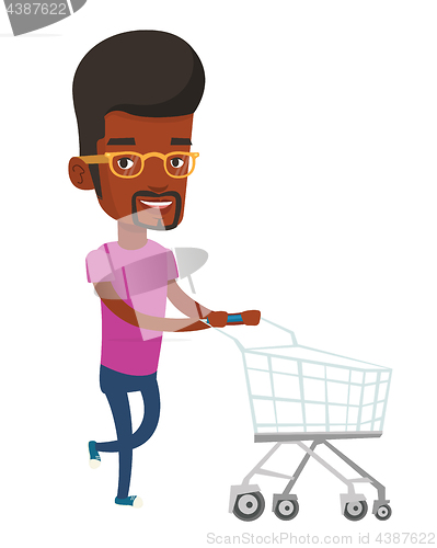 Image of Customer running with shopping trolley.