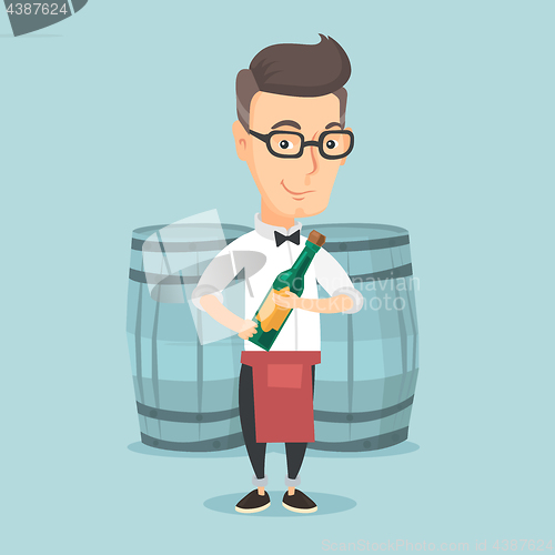 Image of Waiter holding bottle of alcohol.