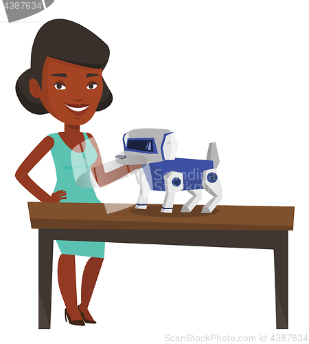 Image of Happy young woman playing with robotic dog.