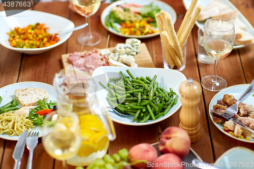 Image of vegetable salad in bowl on wooden table