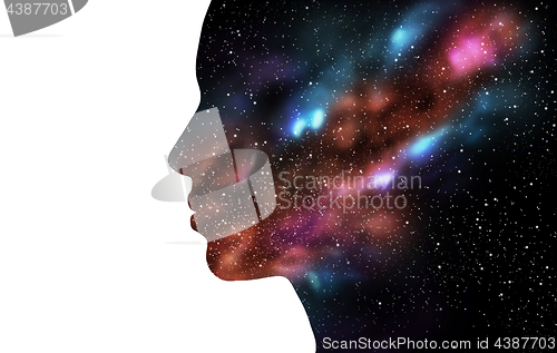 Image of double exposure woman and galaxy