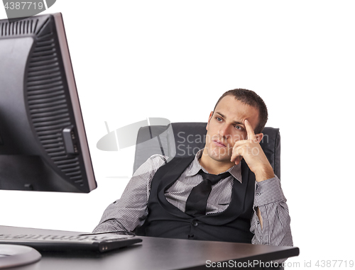 Image of Tired Businessman in Front of His Computer