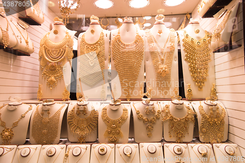 Image of gold jewelry in the shop window