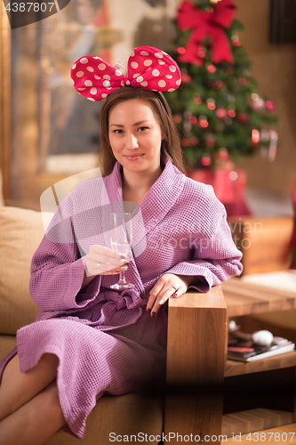 Image of woman drinking champagne at spa