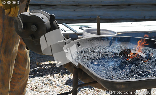 Image of Farrier working outdoors.