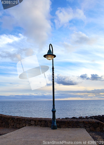 Image of lonely lantern on the walking way