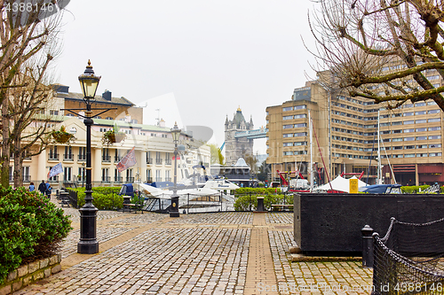 Image of Old lantern and yachts in St Katharine Docks