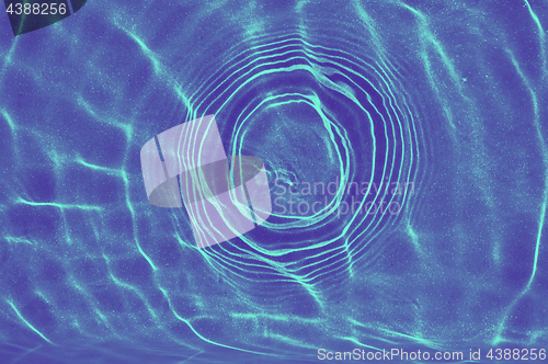 Image of ultra violet and blue duotone water in pool or sea