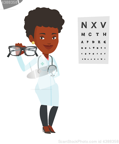 Image of Professional ophthalmologist holding eyeglasses.
