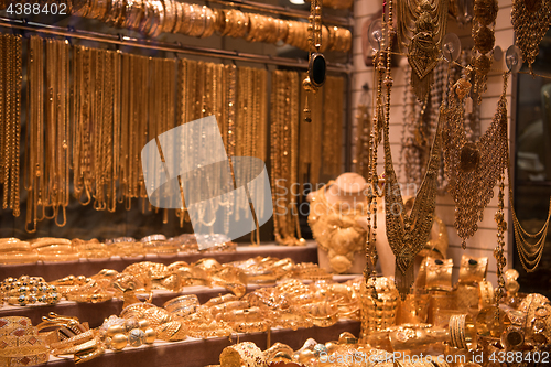 Image of gold jewelry in the shop window