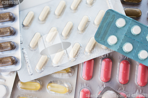 Image of different pills and capsules of drugs