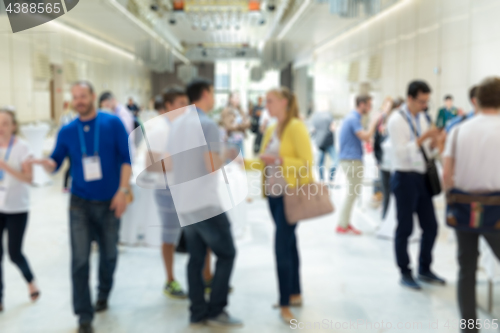 Image of Blured image of businesspeople at coffee break at conference meeting.