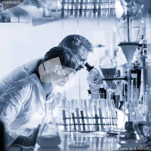 Image of Health care professionals researching in scientific laboratory.