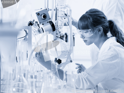 Image of Young female chemists researching in life science laboratory.