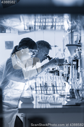 Image of Health care researchers working in scientific laboratory.