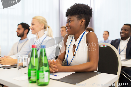 Image of happy business team at international conference