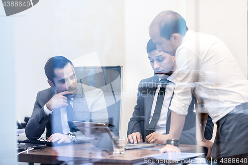 Image of Corporate businessteam working in modern office.