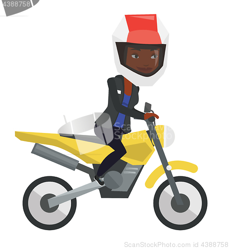 Image of Young african-american woman riding motorcycle.