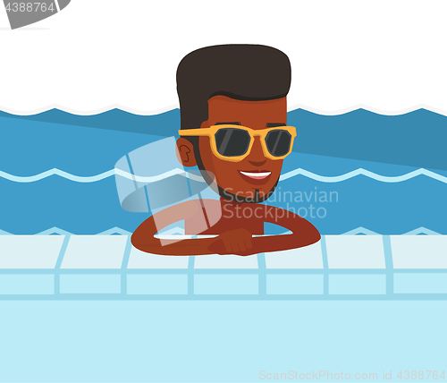Image of Smiling young man in swimming pool.