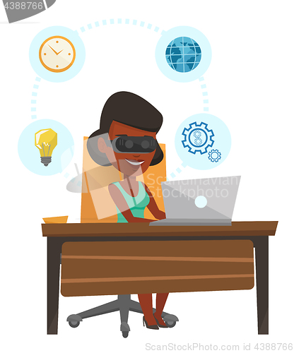 Image of Business woman in vr headset working on computer.