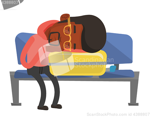 Image of Exhausted man sleeping on suitcase at airport.