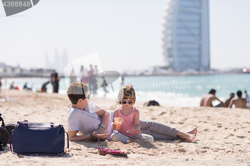 Image of Mom and daughter on the beach