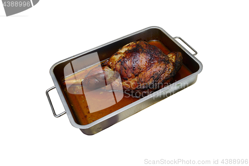 Image of roast leg of lamb in a metal bowl 