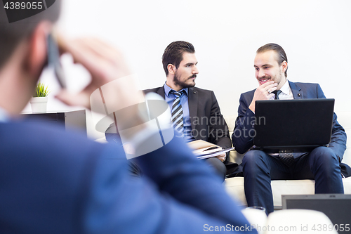 Image of Corporate business team and manager at business meeting.