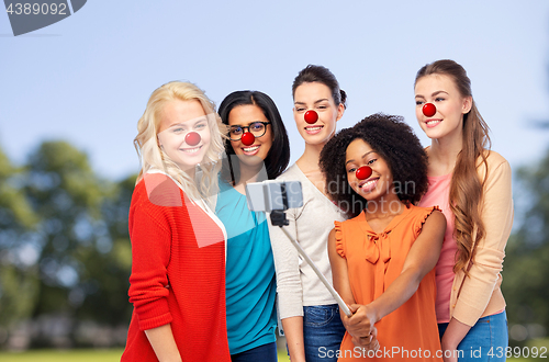 Image of group of women taking selfie at red nose day