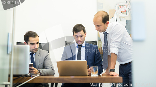 Image of Corporate business team working in modern office.