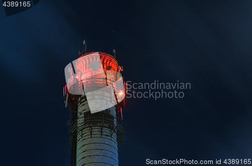 Image of Illuminated Brick Tower Of Thermal Station At Night