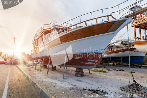 Image of Vintage boats waiting fo reparation