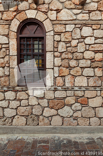 Image of Window on old stone wall