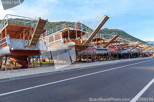 Image of Vintage boats waiting fo reparation