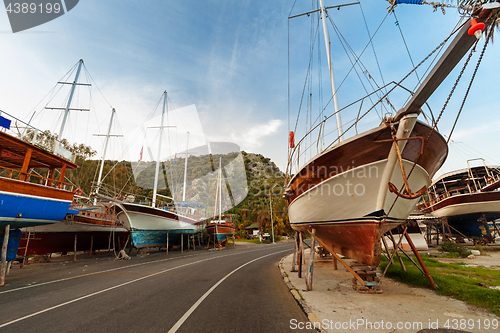 Image of Vintage boats waiting fo reparation