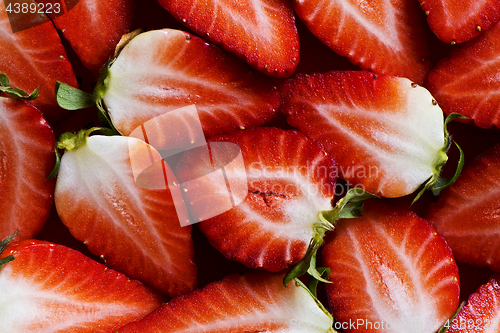 Image of Fresh strawberries sliced into halves