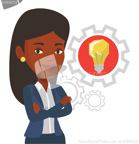 Image of Woman with business idea bulb in gear.