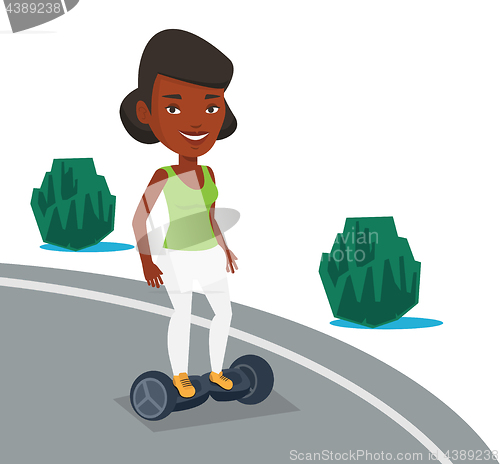 Image of Woman riding on self-balancing electric scooter.