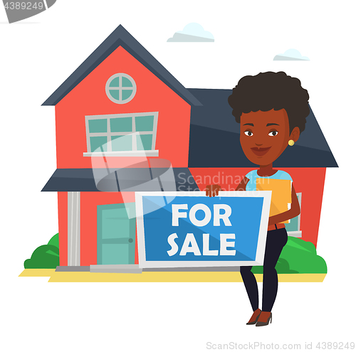 Image of Young african-american realtor offering house.