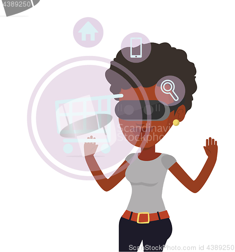 Image of Woman in virtual reality headset shopping online.