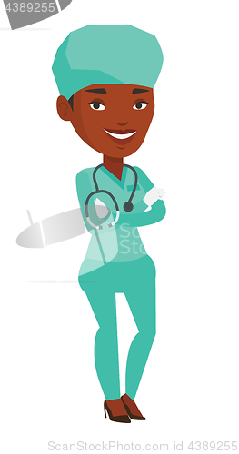 Image of Young confident surgeon with arms crossed.