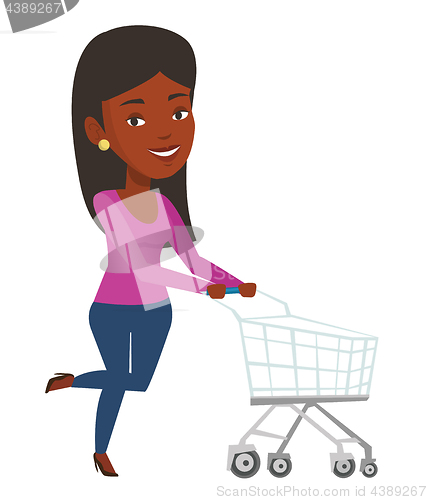 Image of Customer running with shopping trolley.