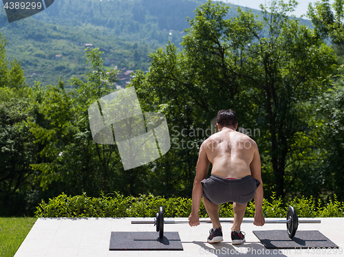 Image of man doing morning exercises