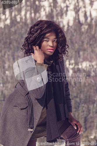 Image of Trendy African woman in winter