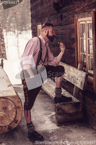 Image of Bavarian man smoking