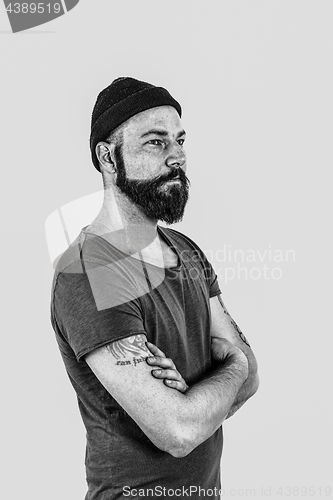 Image of Man with beard and tattoos