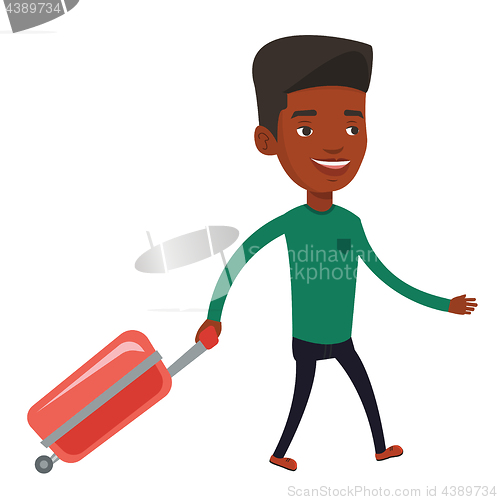 Image of African man walking with suitcase.