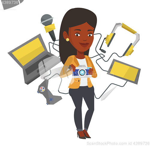 Image of Young woman surrounded with her gadgets.