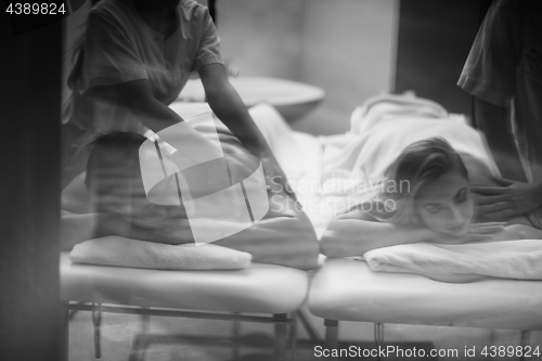 Image of couple receiving a back massage