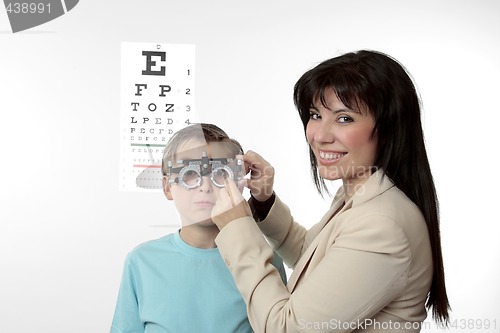 Image of Optometrist and child patient